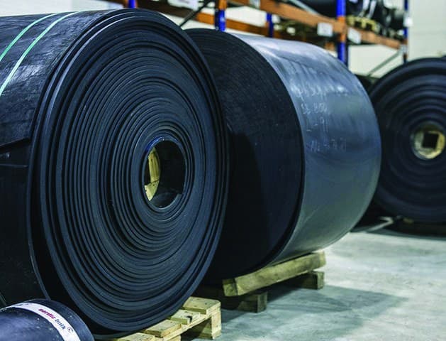 Roll of conveyor belt material